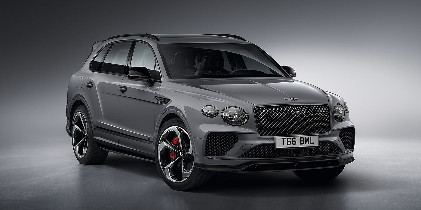 Bentley Bucuresti Bentley Bentayga S in Cambrian Grey paint front three - quarter view with dark chrome matrix grille and featuring elliptical LED matrix headlights. 