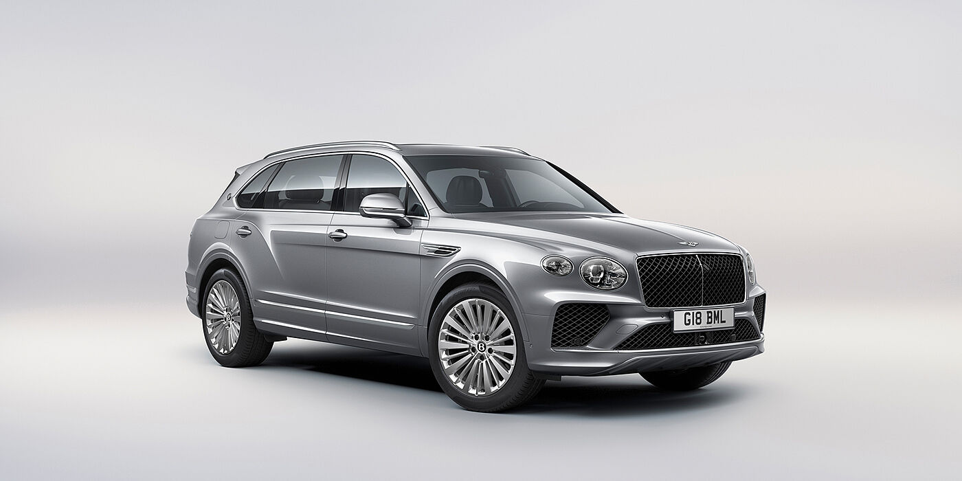 Bentley Bucuresti Bentley Bentayga Extended Wheelbase luxury SUV front three quarter view in Moonbeam paint with 21 inch five spoke painted wheels