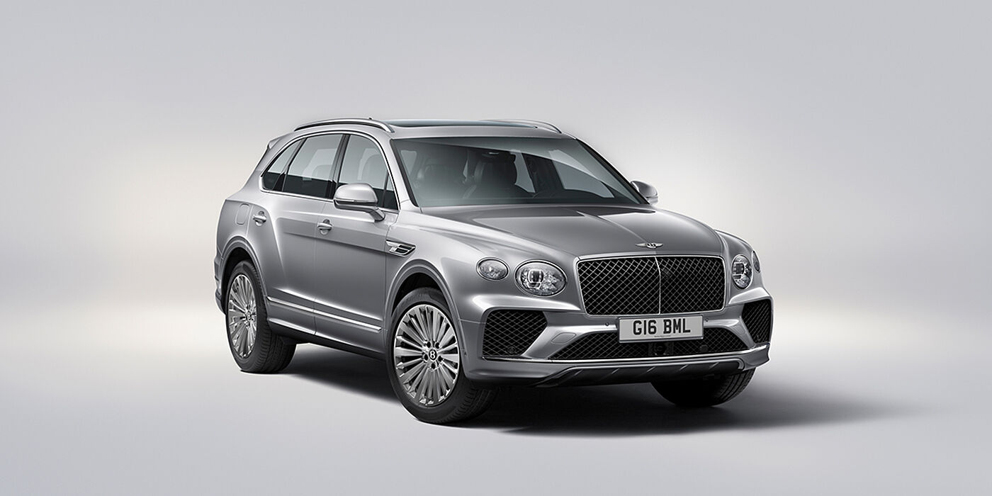 Bentley Bucuresti Bentley Bentayga luxury SUV front three quarter view in Moonbeam paint with matrix grille and 21″ 5 spoke painted wheels