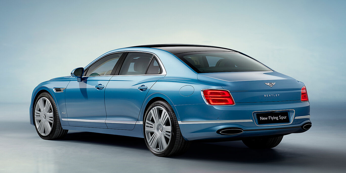 Bentley Bucuresti New Bentley Flying Spur Azure sedan rear view in Light windsor blue by Mulliner paint with 22 inch Azure wheels and chrome exterior details