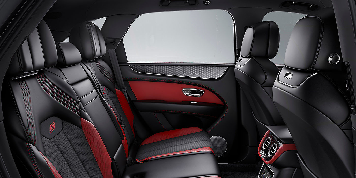Bentley Bucuresti Bentey Bentayga S interior view for rear passengers with Beluga black and Hotspur red coloured hide.