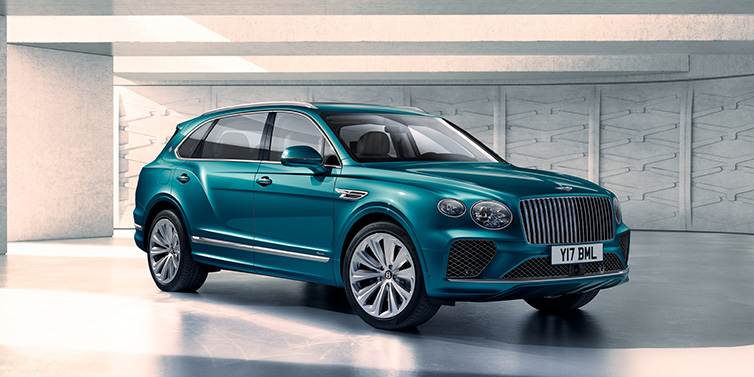 Bentley Bucuresti Bentley Bentayga Extended Wheelbase Azure SUV front three quarter in Topaz blue paint colour with a grey background