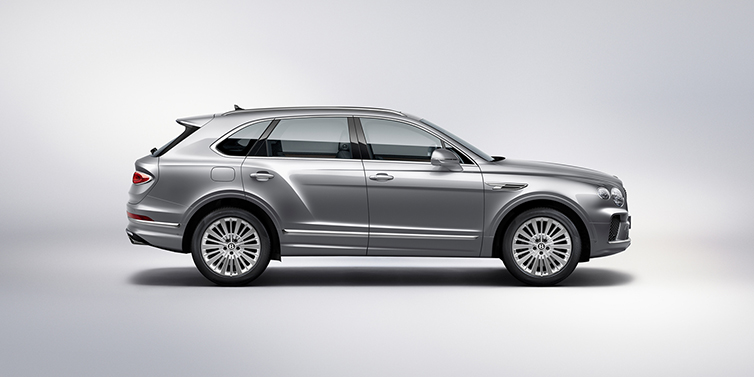 Bentley Bucuresti Bentley Bentayga SUV side profile in Moonbeam silver paint against white background featuring 21 inch 5 spoke wheels