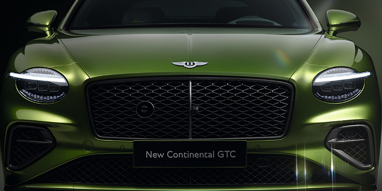 Bentley Bucuresti Bentley Continental GTC Speed convertible front bonnet detail in Tourmaline Green paint showing new light design