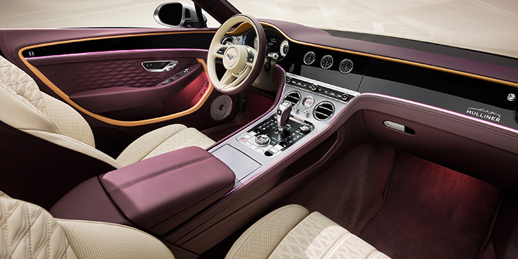 Bentley Bucuresti Bentley Continental GTC Mulliner convertible front interior including Linen and Damson purple hides and Grand Black veneer