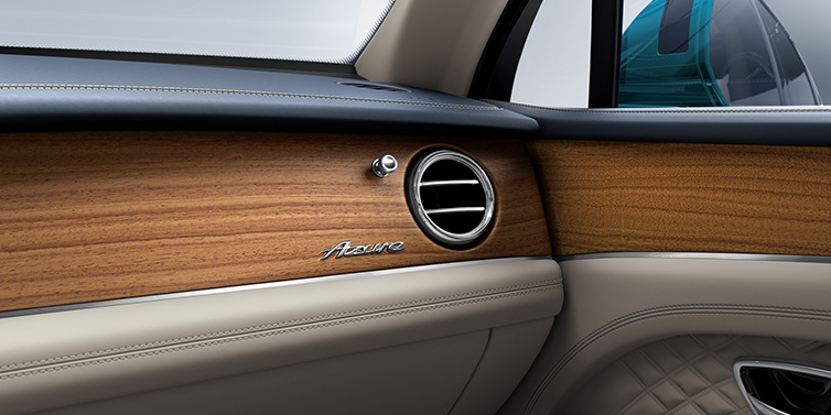 Bentley Bucuresti Bentley Bentayga Extended Wheelbase Azure front dash showing Open Pore Koa veneer surrounded by Portland and Imperial Blue hides